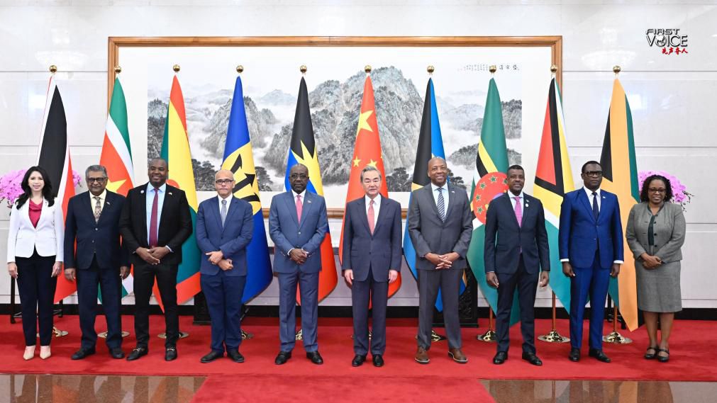 Chinese Foreign Minister Wang Yi, also a member of the Political Bureau of the Communist Party of China Central Committee, meets with foreign ministers and representatives of the Caribbean countries having diplomatic relations with China, in Beijing, capital of China, May 12, 2025. /Xinhua